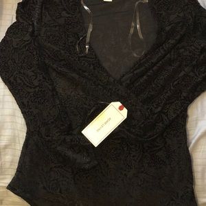 Adam Levine body suite